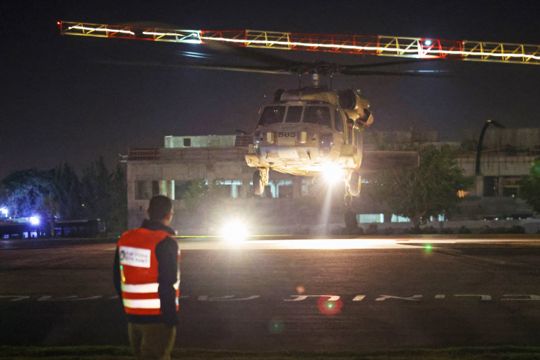 A helicopter carrying two Israeli-Russian hostages lands at the Sheba Medical Center.