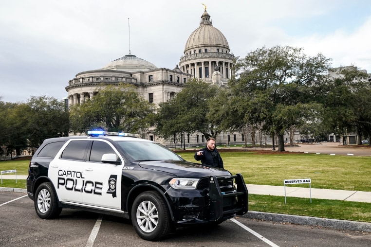 Image: A Capitol Police officer warns off passersby