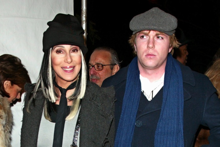Cher, left, and Elijah Blue Allman stand next to each other
