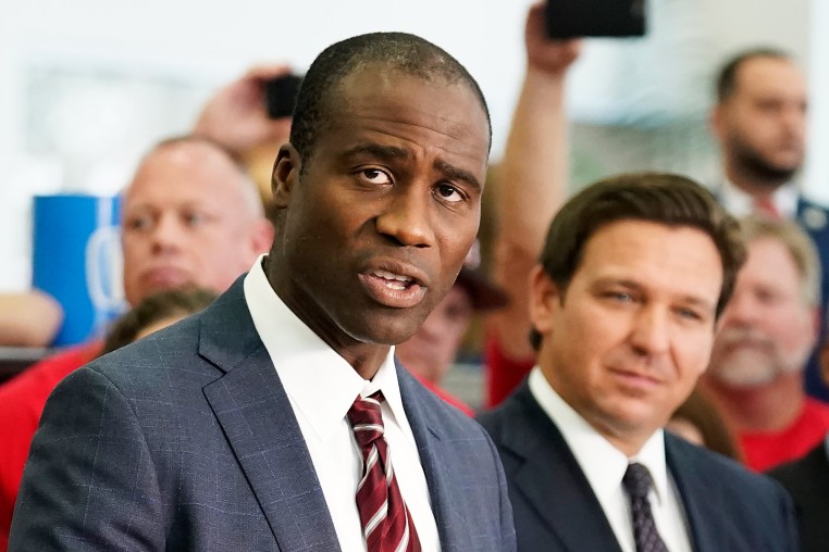 Joseph Ladapo and Gov. Ron DeSantis  at a bill signing in 2021.