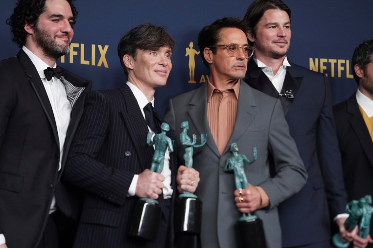 From left, Benny Safdie, Cillian Murphy, Robert Downey Jr., and Josh Hartnett, winners of the award for outstanding performance by a cast in a motion picture for "Oppenheimer," at the 30th annual Screen Actors Guild Awards on Saturday, Feb. 24, 2024, in Los Angeles.