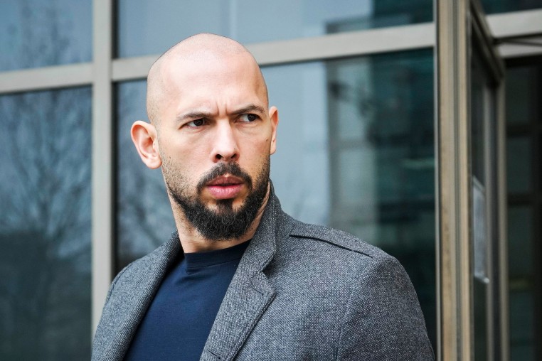 Online influencer Andrew Tate detained in Romania, handed U.K. arrest warrant, his spokesperson says.