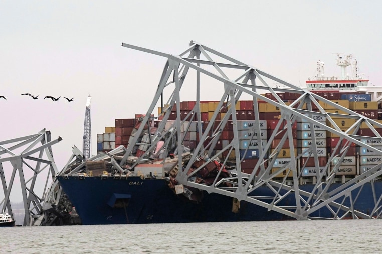 Cargo ship Dali is seen after running into and collapsing the Francis Scott Key Bridge