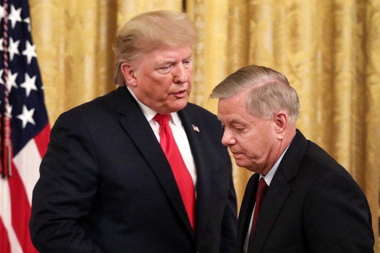 Donald Trump, left, and Lindsey Graham during an event at the White House
