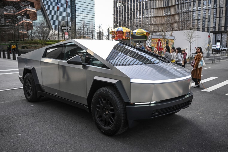 A Tesla Cybertruck drives in Hudson Yards in New York City