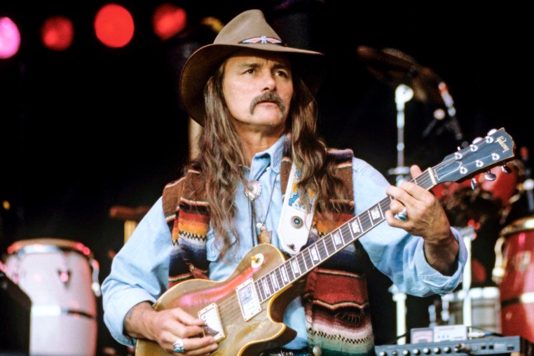 Dickey Betts performs with his guitar