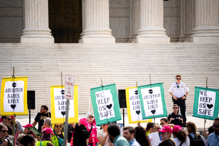 Abortion rights supporters rally outside the Supreme Court.