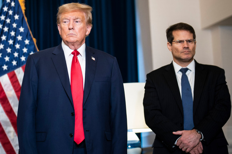 Donald Trump and D. John Sauer during a press conference at the Waldorf Astoria hotel in Washington, D.C. 