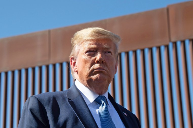 Donald Trump visits the US-Mexico border fence in Otay Mesa, Calif.