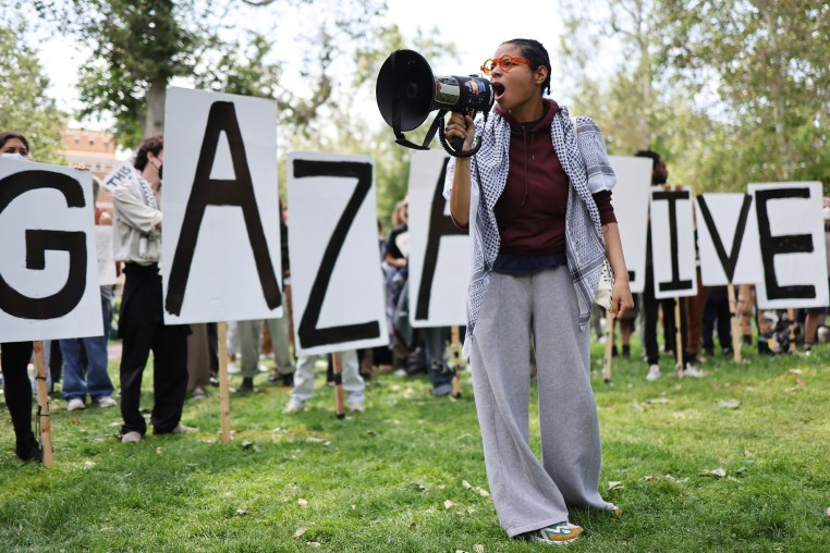 Pro-Palestine demonstrators rally at an encampment in support of Gaza at the University of Southern California