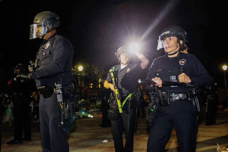 UCLA pro-Palestinian protesters clash with police at Los Angeles campus.
