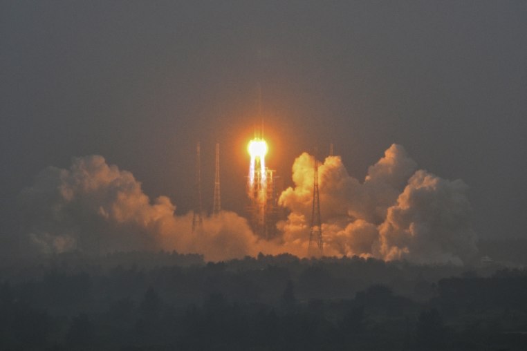 A Long March 5 rocket, carrying the Chang'e-6 mission lunar probe, lifts off 
