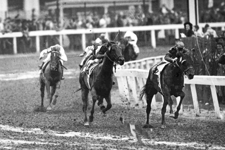 Black and White image of horses at Kentucky Derby.