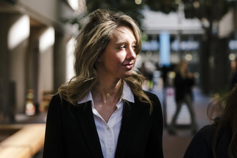 Elizabeth Holmes leaves federal court in San Jose in 2019.