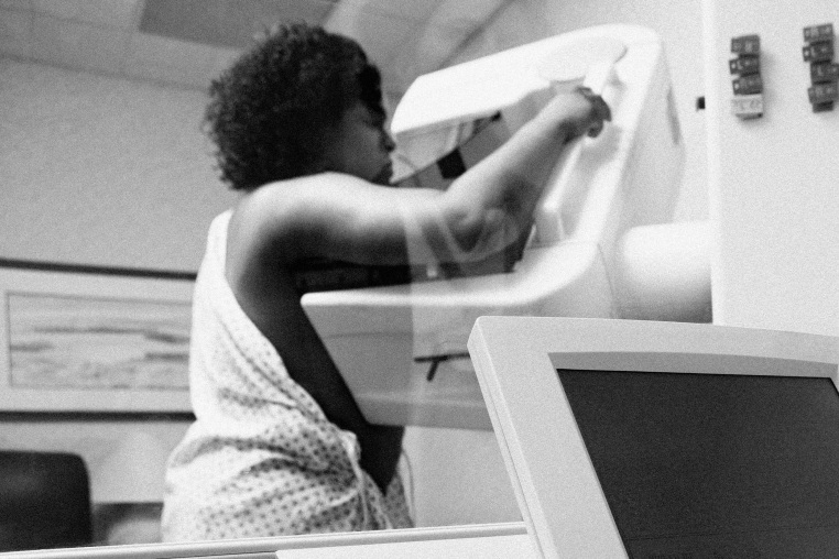 A Black patient a getting mammogram