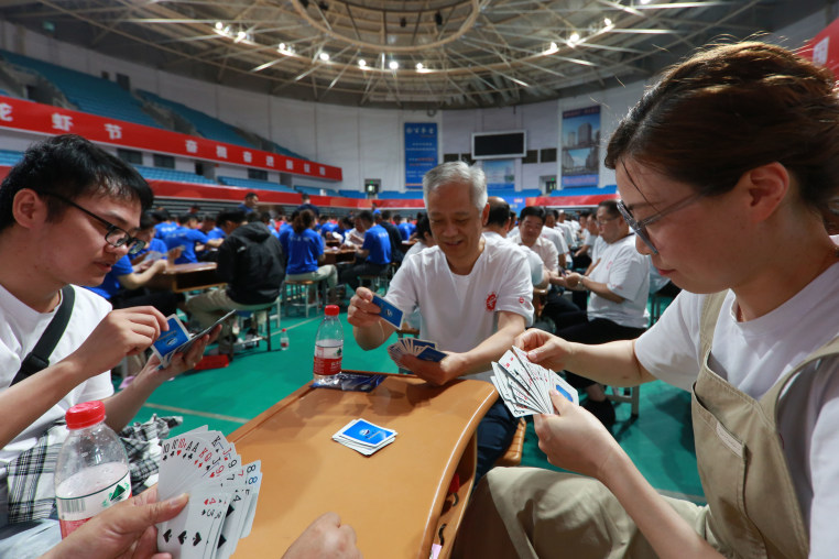 Guandan is a poker game originated in Huai 'an, where the game is played by four people in pairs.