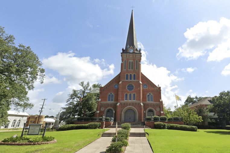 Teen with rifle stopped from entering Louisiana church where 60 kids were taking their first communion.