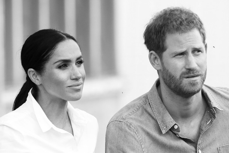 A black and white photo of Prince Harry and Meghan Markle