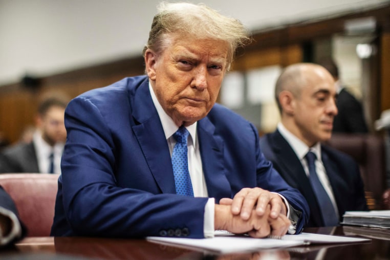 Former President Donald Trump sits in the courtroom