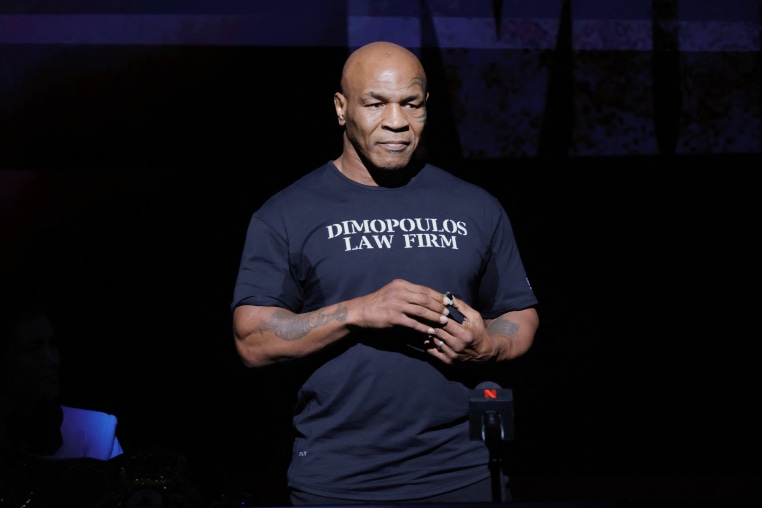 Mike Tyson speaks at a press conference at the Apollo Theatre in New York.