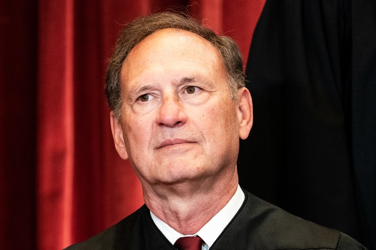 Associate Justice Samuel Alito sits during a group photo of the Justices at the Supreme Court in Washington, DC on April 23, 2021.