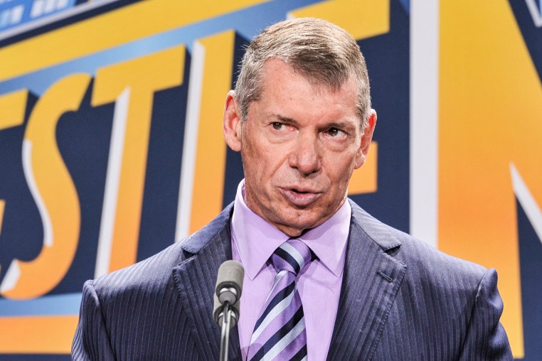 Vince McMahon speaks during a press conference