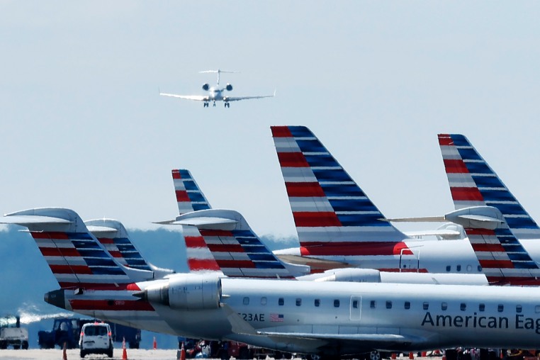 File photo shows passenger planes parked at Reagan National Airport in Arlington, Virginia, on August 8, 2024. 