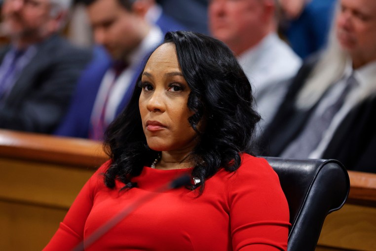 Fani Willis seated during a hearing in Atlanta