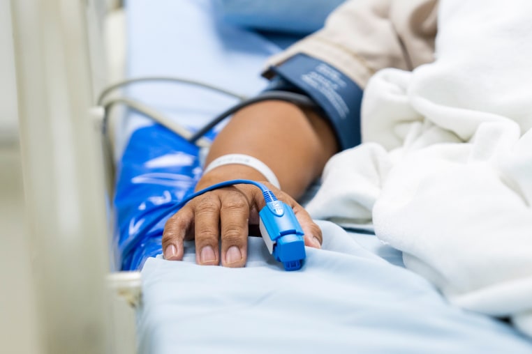 Patient in hospital bed