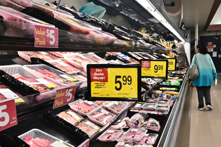A woman browses the meat aisle at a supermarket in Montebello, Calif., on May 15, 2024. 
