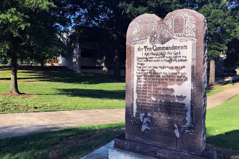 A 6-foot-tall Ten Commandments monument is seen on the Arkansas Capitol grounds in Little Rock.