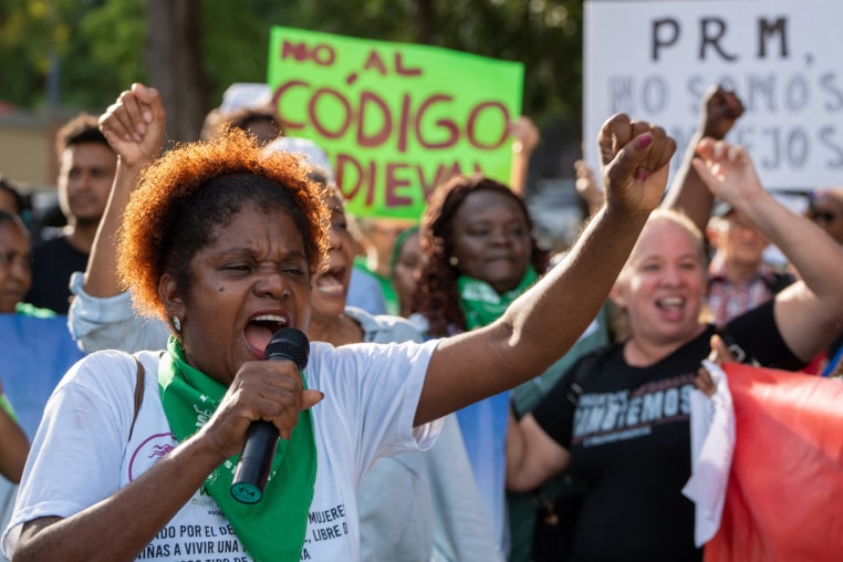 Demonstrators protest in front of the Dominican Parliament in Santo Domingo, Dominican Republic
