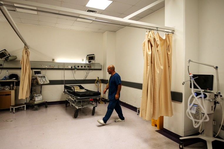 Stockpiling medical supplies and planning evacuations, hospitals are bracing for the worst, compensating for resource shortages by drawing on their experience from previous conflicts. 