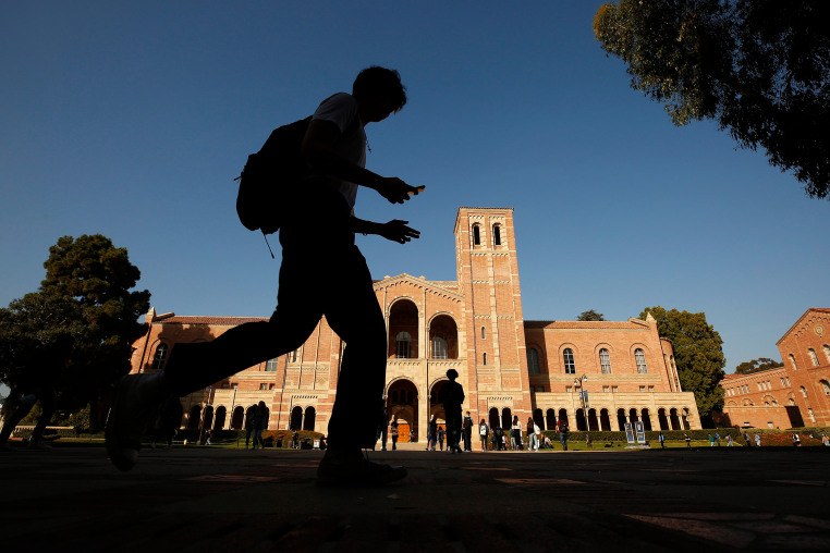 Royce Hall UCLA silhouette campus student