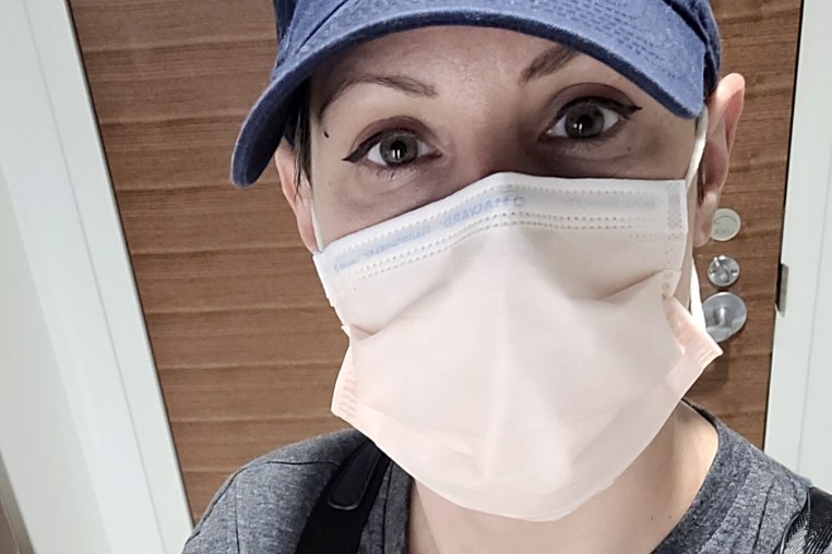 Kelly Betts wears a mask for medical reasons while out in public.
