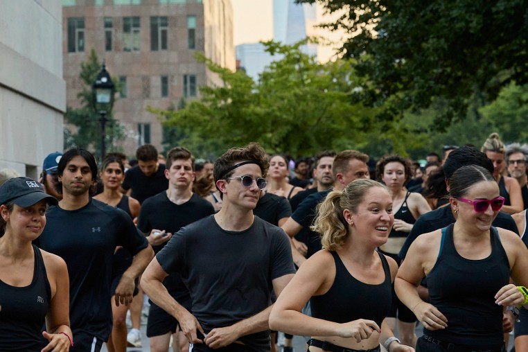 Runners part of the Lunge Run Club depart Washington Square Park in New York on Aug. 28.