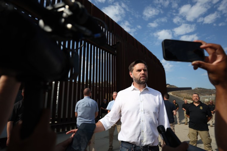 Republican vice presidential nominee Sen. J .D. Vance speaks to reporters in front of the border wall with Mexico on Sept. 06, 2024 in San Diego, California. 