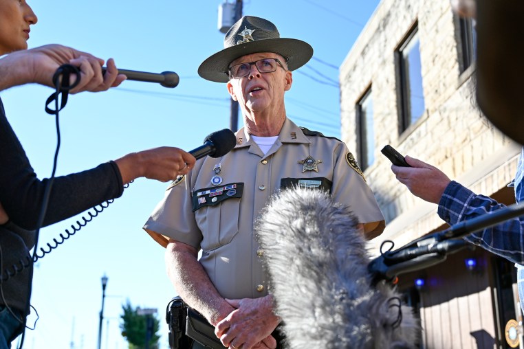 Gilbert Acciardo speaks to reporters outside