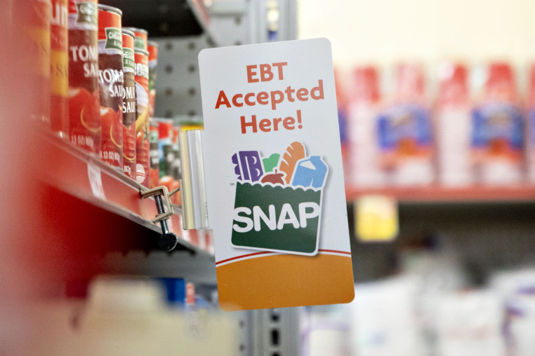 An "EBT Accepted Here" sign at a Family Dollar store.