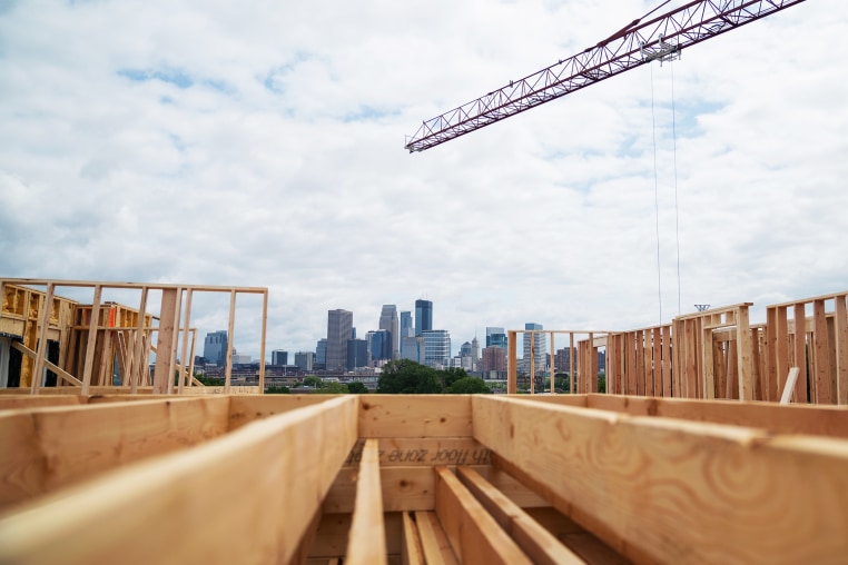 A construction site with a view of Minneapolis
