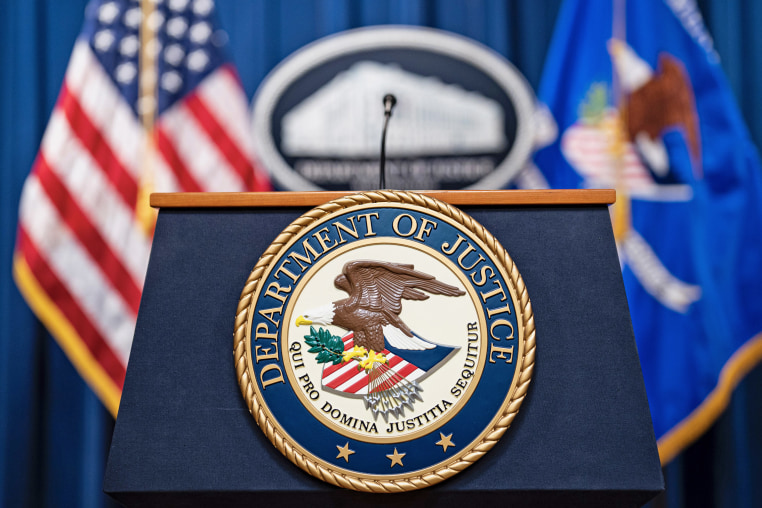 Seal of the Department of Justice.