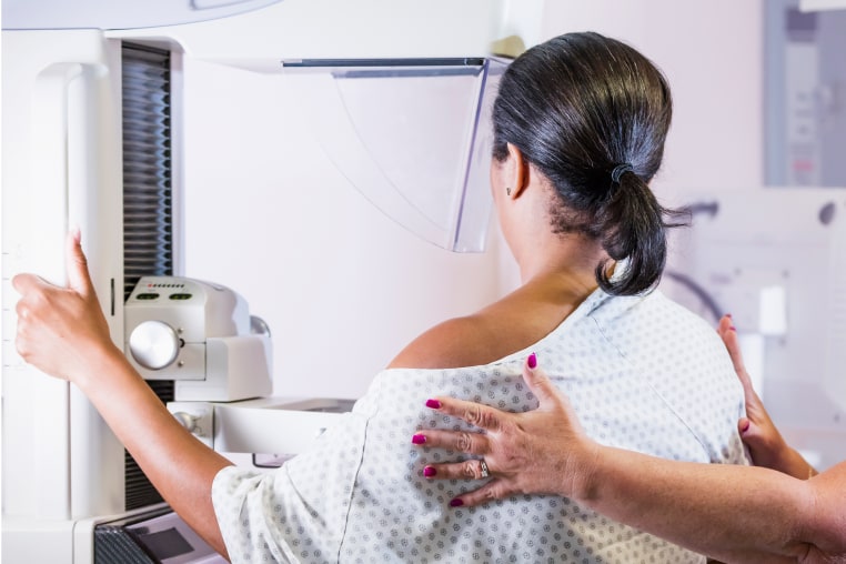 African-American woman getting a mammogram