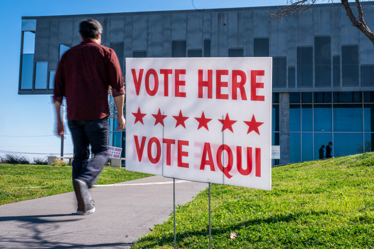 A voter enters a polling location.