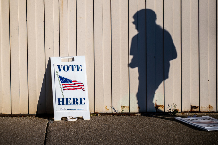 A voter walks to cast their ballot