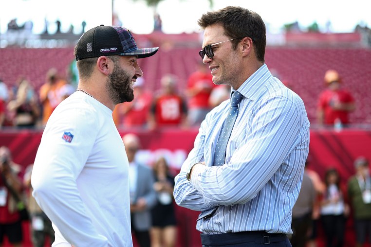 Tom Brady talks with Baker Mayfield 