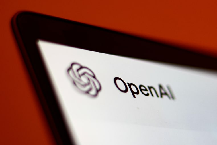 A screen with OpenAI logo.