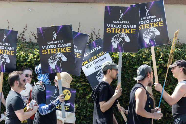 Video game actors picket Warner Bros. Studio