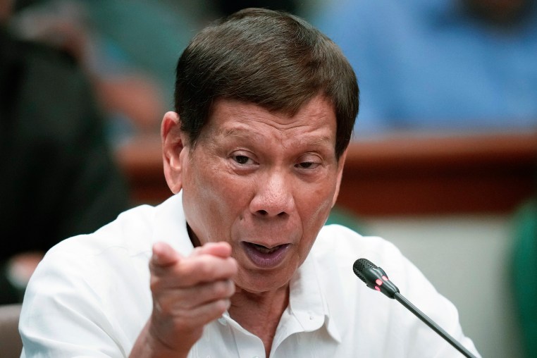 Former Philippine President Rodrigo Duterte confirmed a “death squad” existed under his watch to control crime when he was Davao City mayor, but gave conflicting accounts of its makeup, first saying it was run by police officers, then by gangsters.