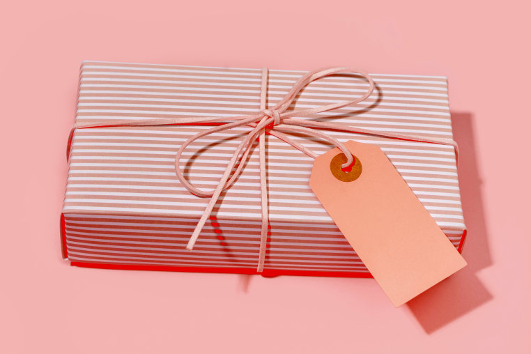 Photo Illustration: A wrapped gift with a price tag