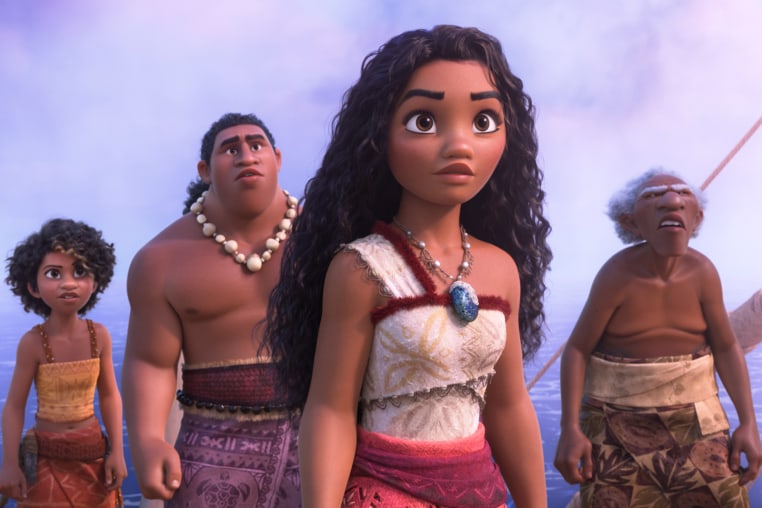 Moana, center, and three other characters behind her stand and stare